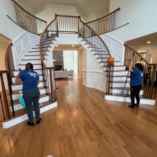 Team cleaning a grand staircase Team cleaning a grand staircase with reliable service in Boston.